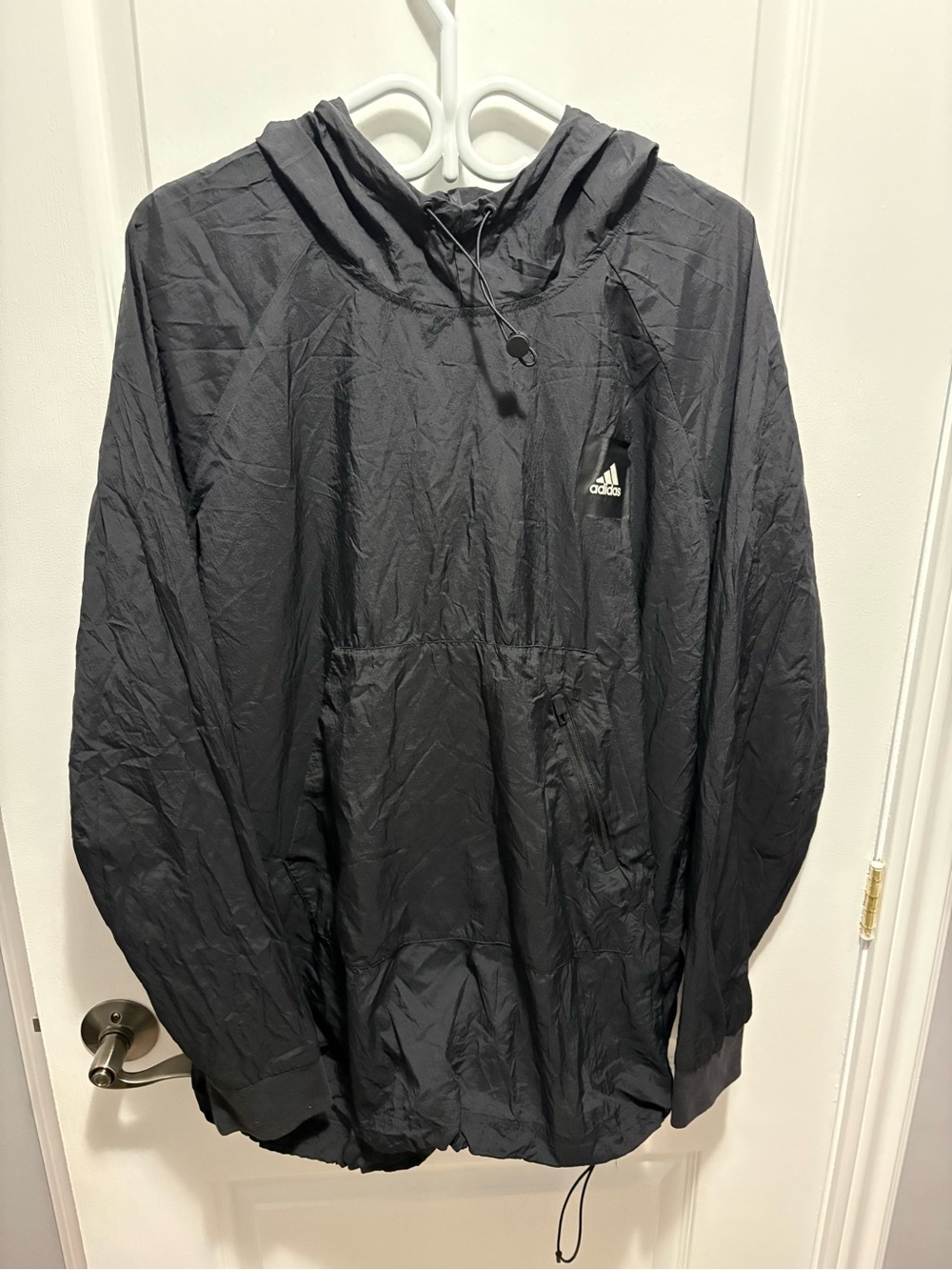 Adidas ultra lightweight windbreaker hoodie jacket.